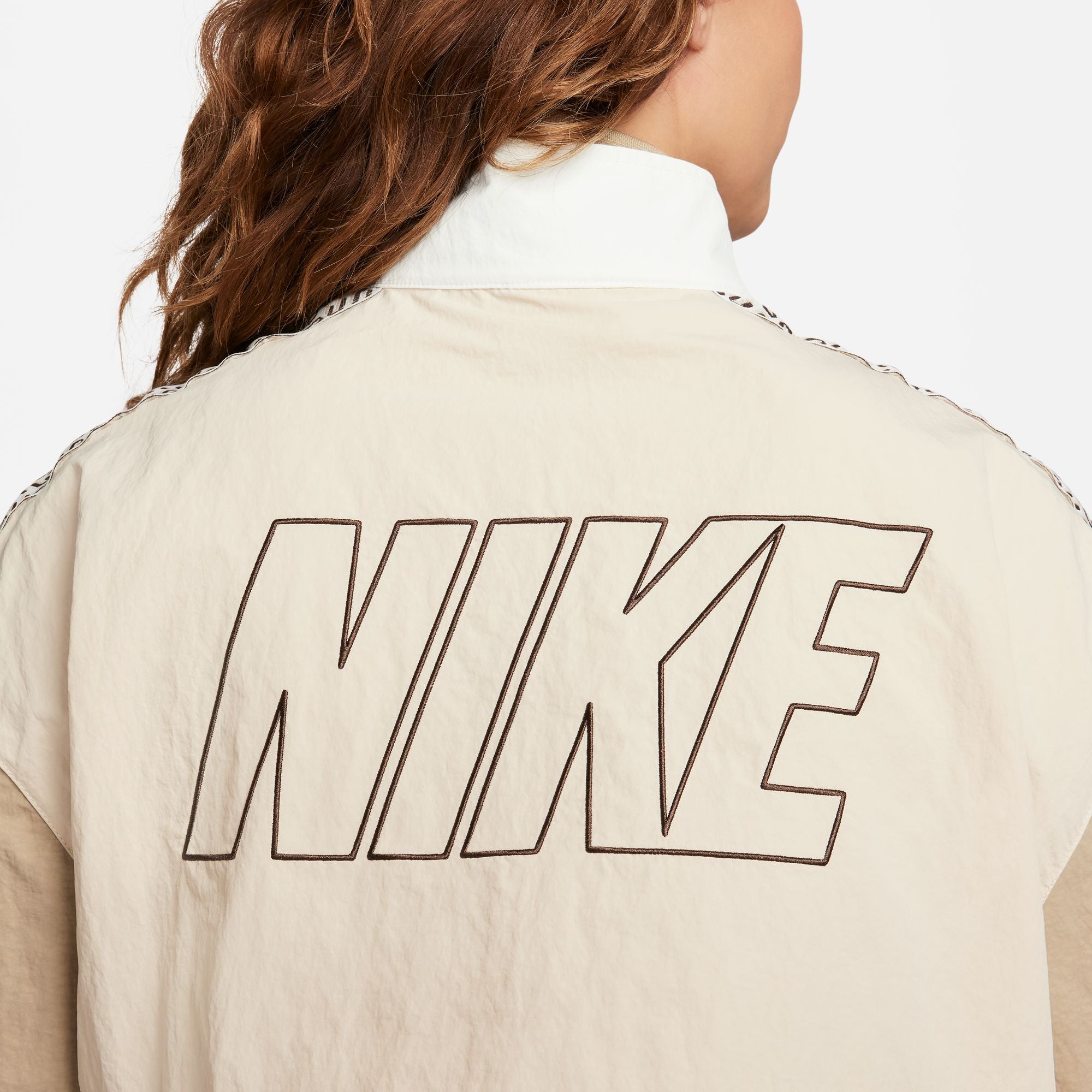 Nike Sportswear x Nike United Women's Oversized Woven Track Jacket - FB8372-126-NIKE by Nike | Available at Niky's Sports