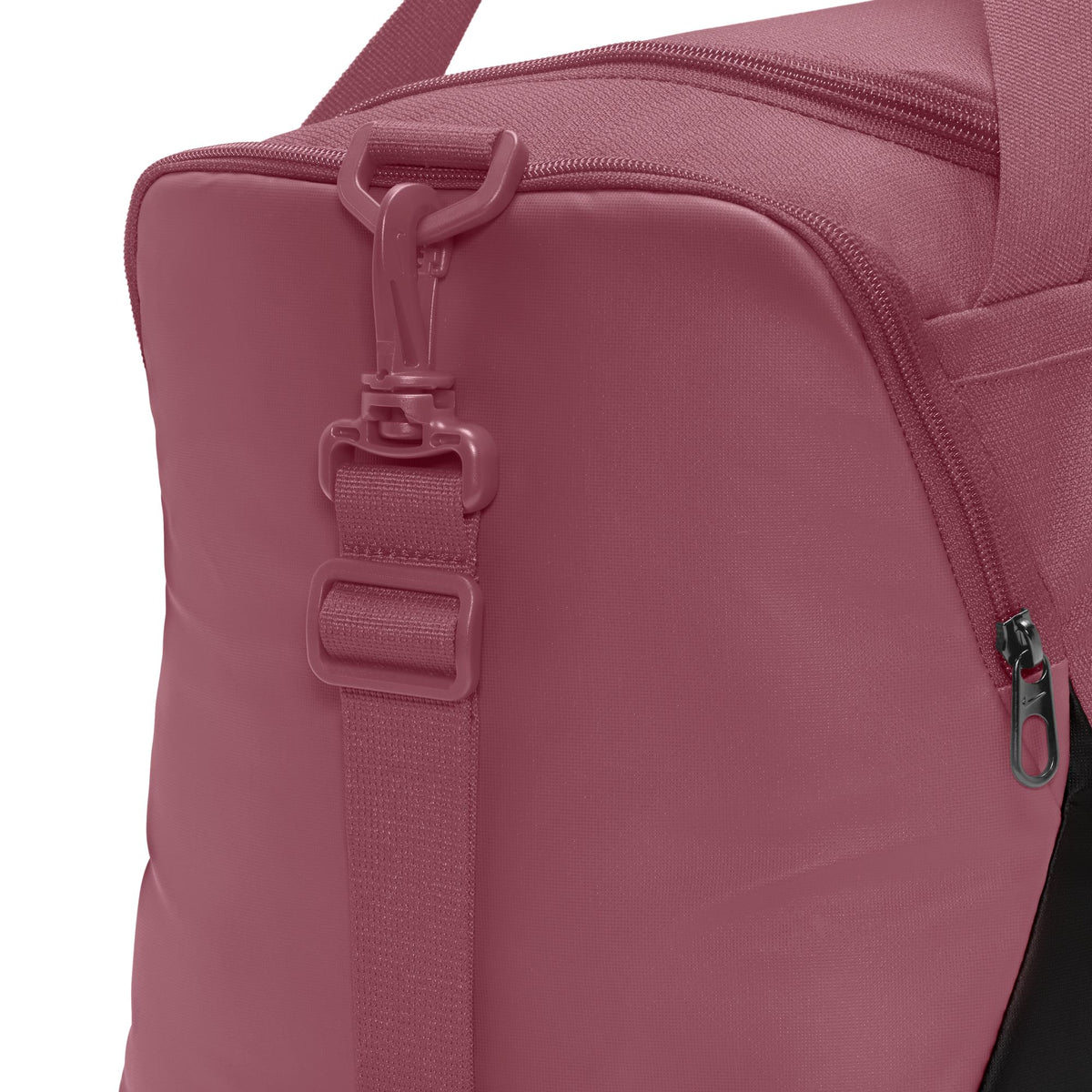 Nike Brasilia extra small 24L duffel bag in Pink Smoke, shoulder strap attachment detail