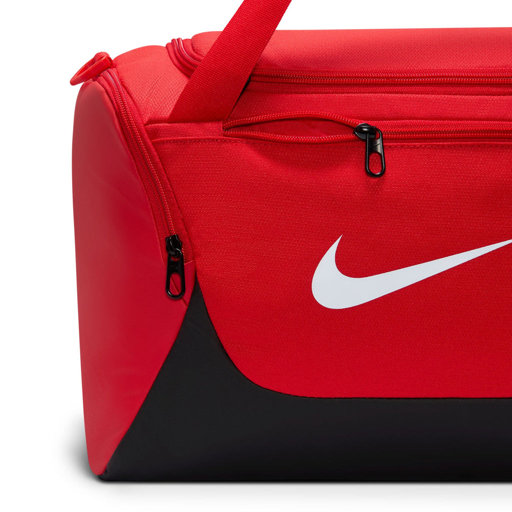 Nike Brasilia extra small 24L duffel bag in University Red, front zip pocket detail