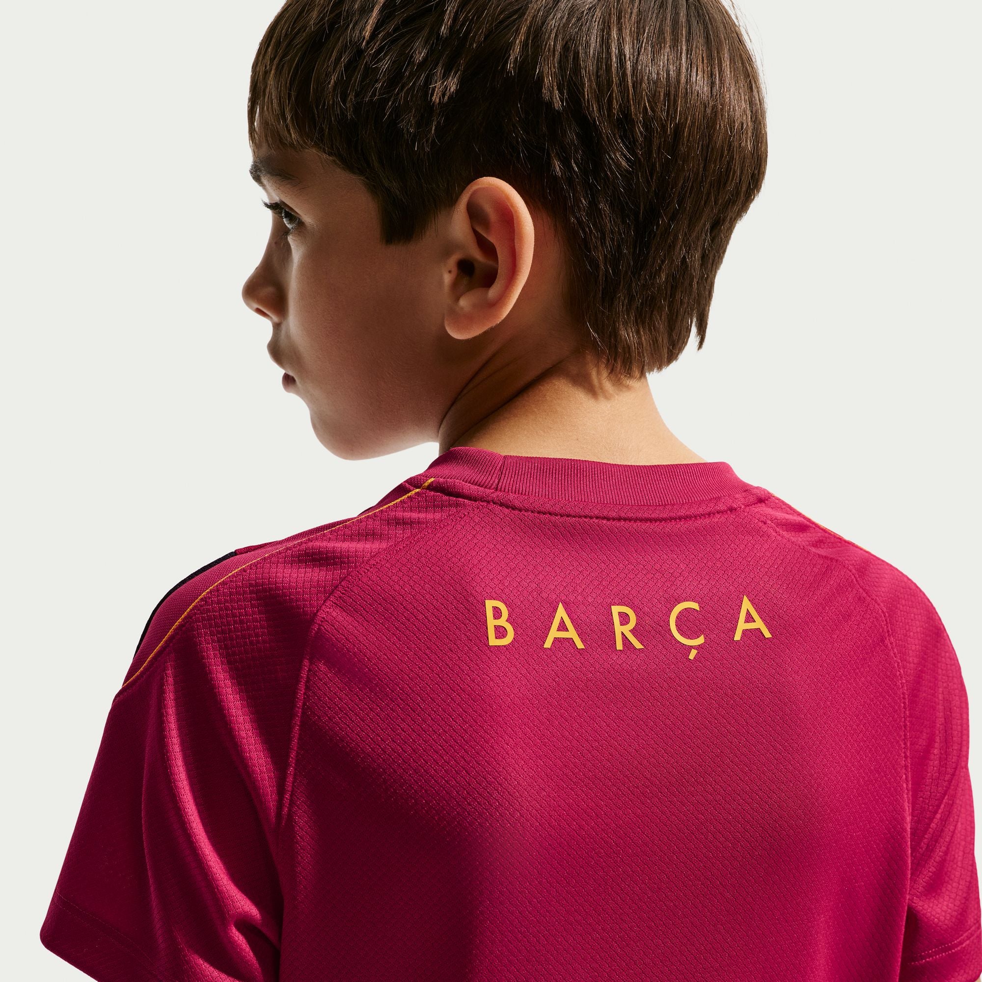 Nike FC Barcelona Strike Big Kids' Soccer Dri-FIT Short-Sleeve Top