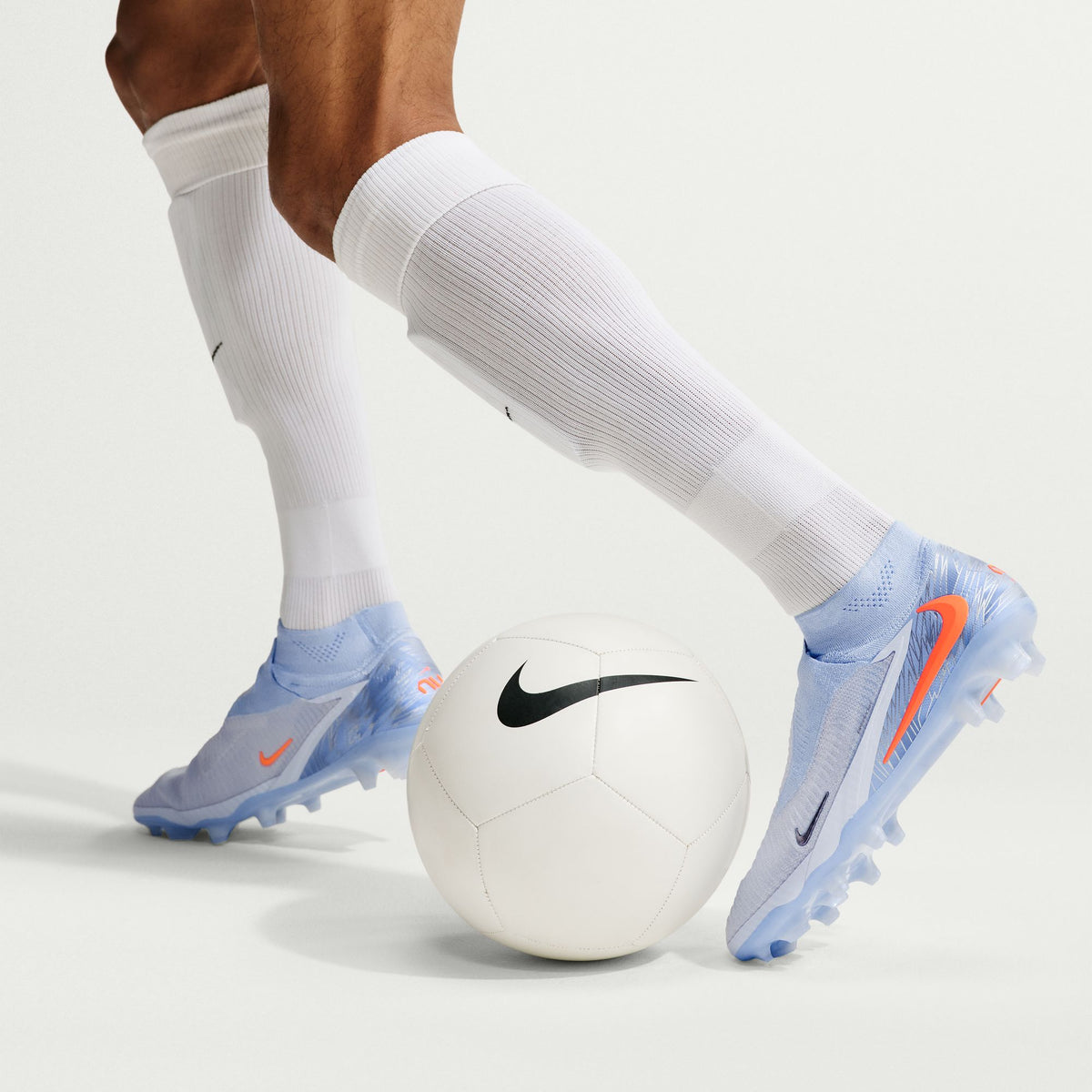 Nike United Phantom 6 High Elite FG soccer cleats in Multi-Color/Black, on-foot view — IQ7651-900