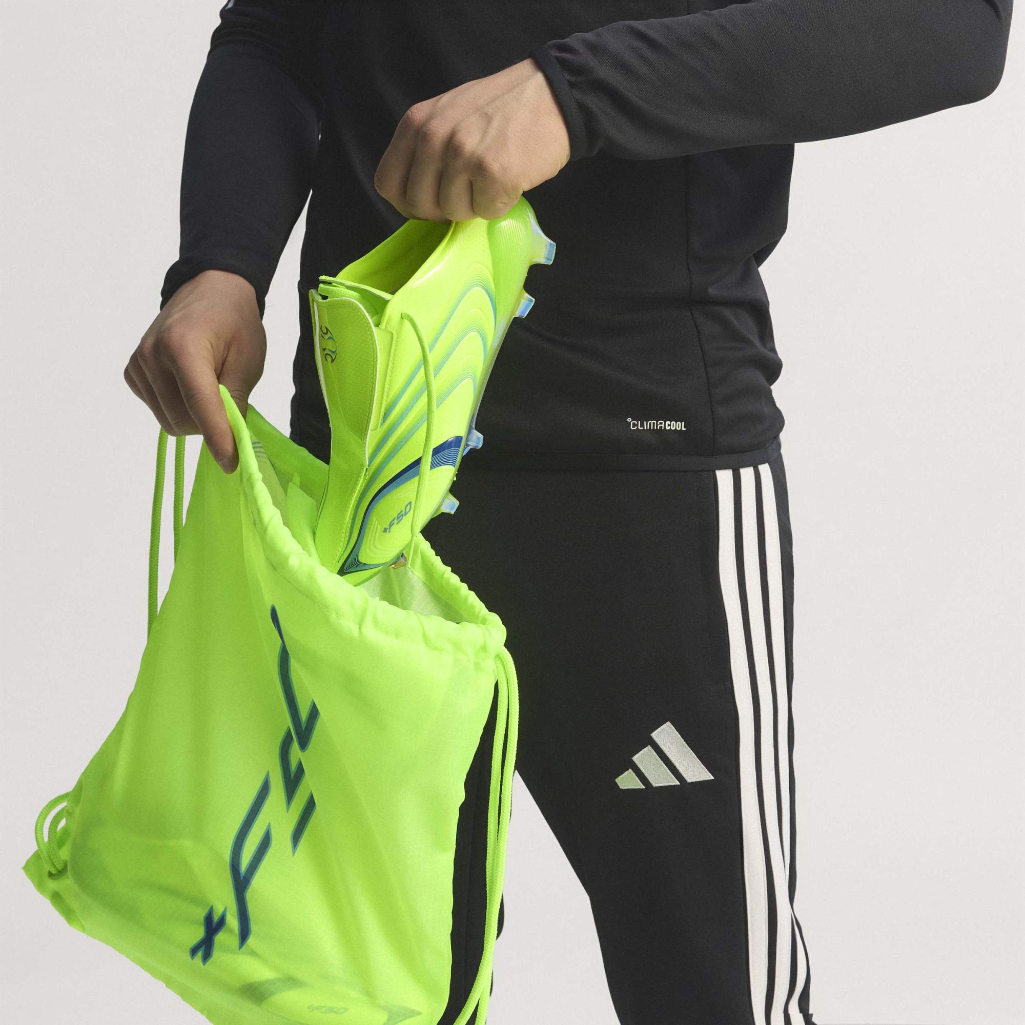 adidas F50 TUNIT Firm Ground Soccer Cleats