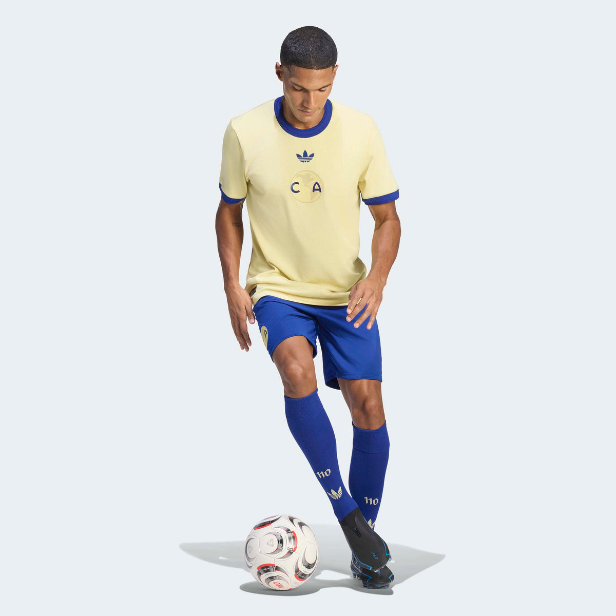 adidas Club America 26/27 Anniversary Jersey in Powder Yellow / Mystery Ink, walking view on model