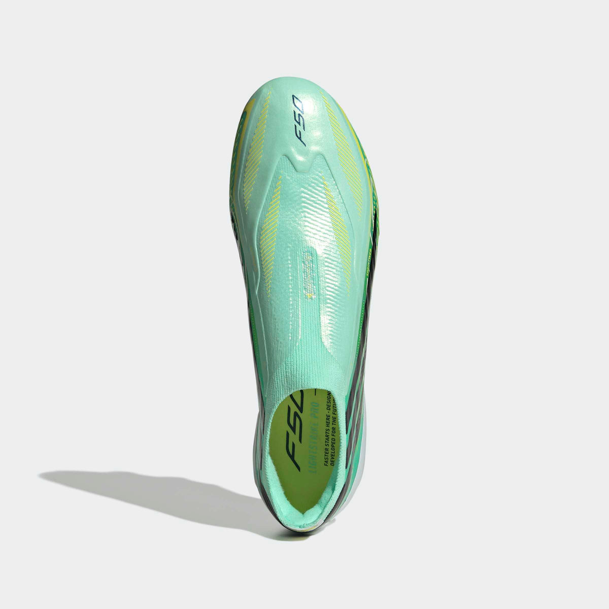 adidas F50 Hyperfast Elite Laceless FG soccer cleats in Pulse Mint / Core Black / Solar Lemon, top view