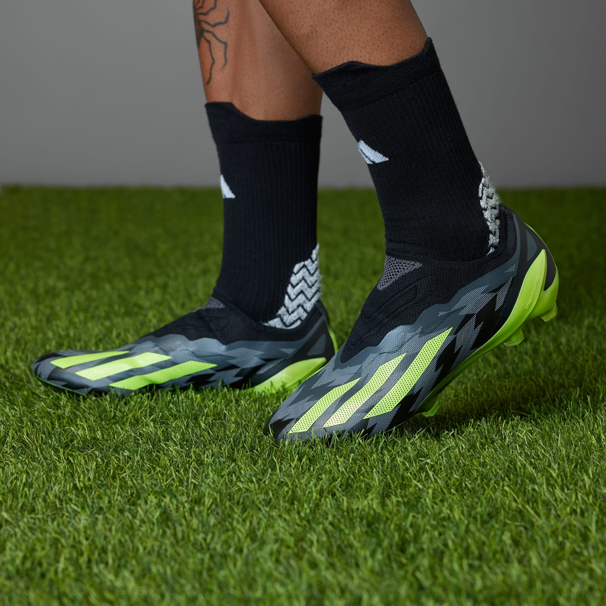 adidas X CRAZYFAST INJECTION.1 LACELESS FIRM GROUND SOCCER CLEATS