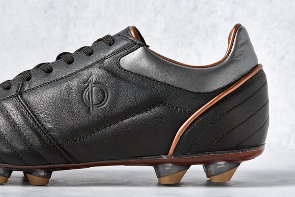 Real leather top soccer cleats