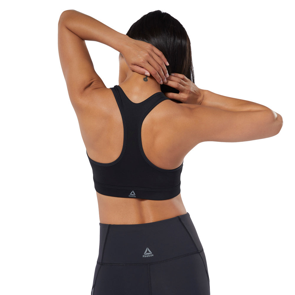 WOMEN'S REEBOK STUDIO CARDIO ZIP MEDIUM-IMPACT BRA - EB8111-REEBOK by Reebok | Available at Niky's Sports