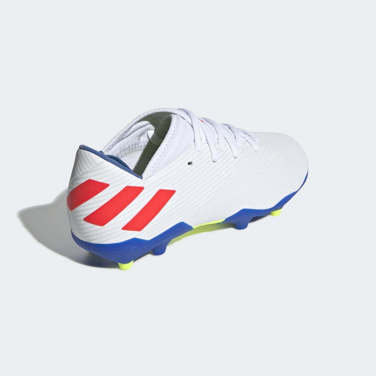 Nemeziz Messi 19.3 FG Kid's Cleats - Footwear White/Solar Red/Football Blue - F99933-ADIDAS by Adidas | Available at Niky's Sports