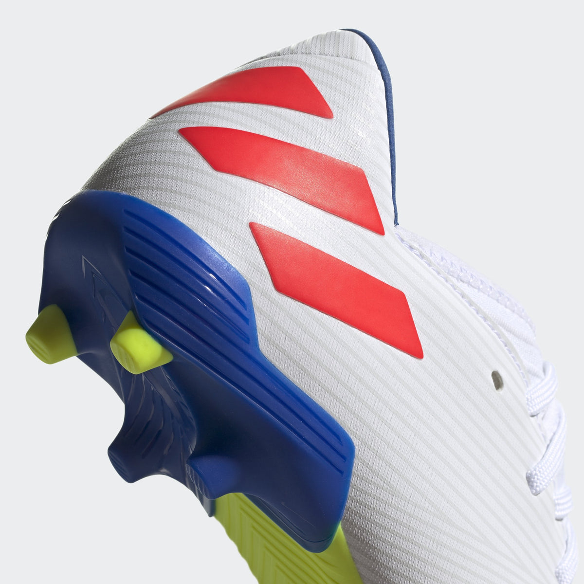 Nemeziz Messi 19.3 FG Kid's Cleats - Footwear White/Solar Red/Football Blue - F99933-ADIDAS by Adidas | Available at Niky's Sports