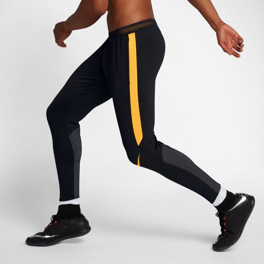 Orange and black nike soccer pants sales