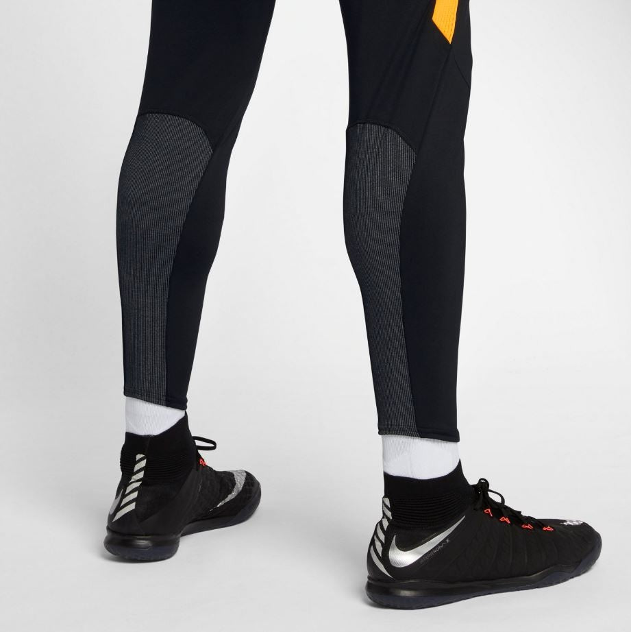 Orange and black nike soccer pants sales