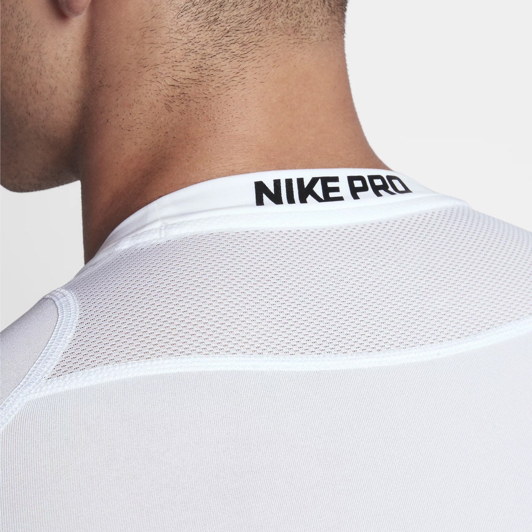 white nike short sleeve compression shirt